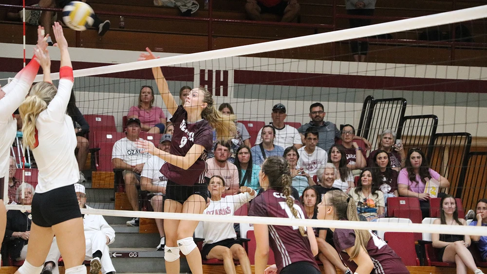 Bobcat Athletes Preparing to spike the ball